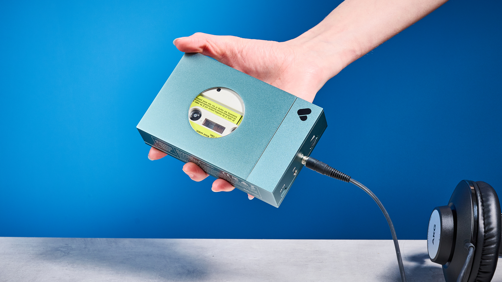 We Are Rewind Cassette Player in blue photographed in front of a blue background